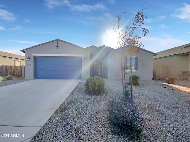 ranch-style home with a garage