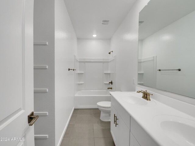 full bathroom with tile patterned flooring, vanity, shower / bathtub combination, and toilet