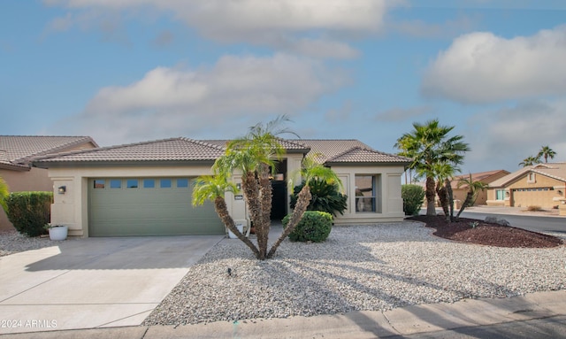 view of front of property with a garage