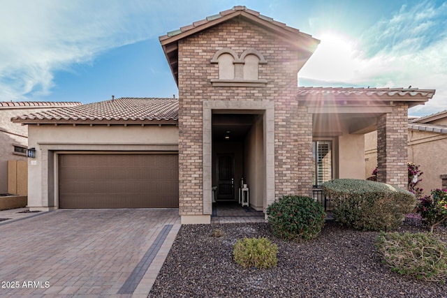 view of front of property featuring a garage