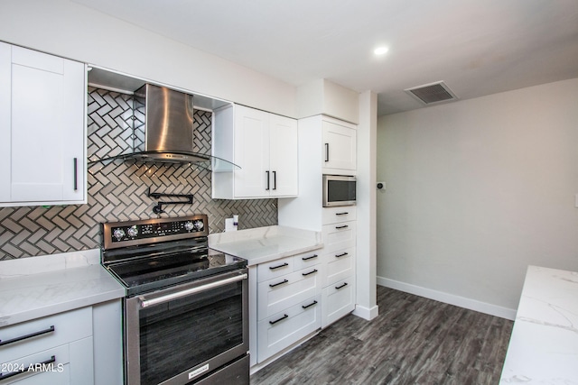 kitchen with wall chimney exhaust hood, white cabinetry, dark wood-type flooring, and stainless steel electric range