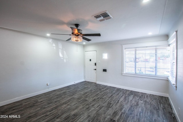 interior space with ceiling fan and dark wood-type flooring