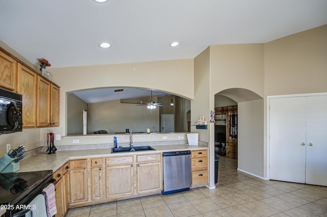 kitchen with arched walkways, a sink, vaulted ceiling, light countertops, and black appliances