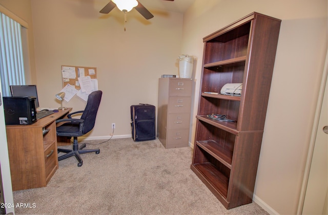 carpeted home office with ceiling fan