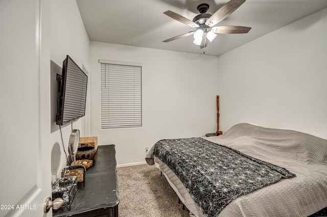 bedroom with carpet floors, ceiling fan, and baseboards