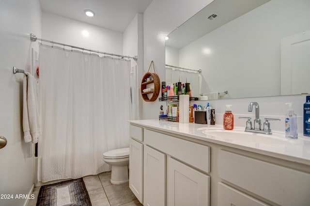 bathroom featuring shower / bath combo, visible vents, toilet, tile patterned floors, and vanity