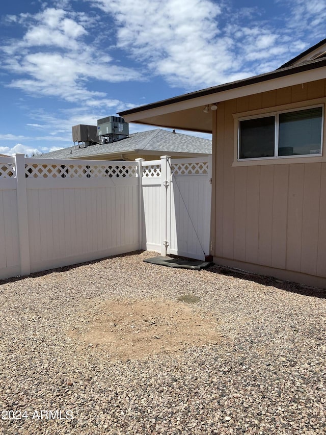 view of yard featuring central AC