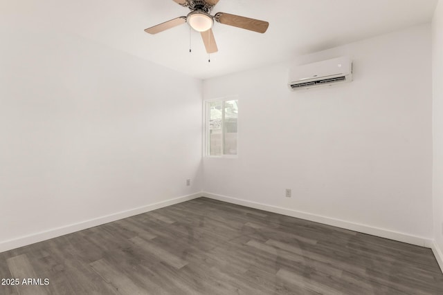 538 W 13th St, Tempe, AZ 85281 - spare room with a wall mounted air conditioner, dark wood finished floors, baseboards, and ceiling fan