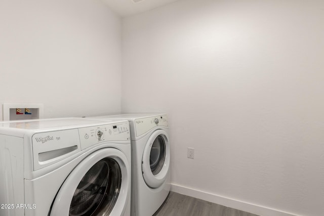 538 W 13th St, Tempe, AZ 85281 - laundry area featuring washing machine and clothes dryer, wood finished floors, and baseboards