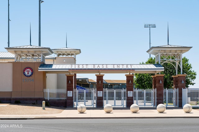 view of building exterior with fence