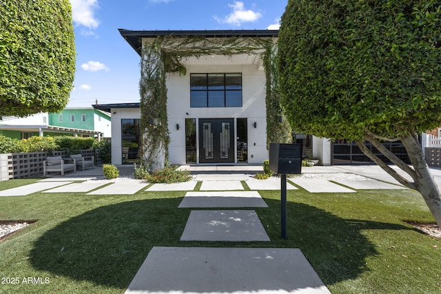 1807 E Campbell Ave, Phoenix, AZ 85016 - property entrance featuring french doors, stucco siding, and a lawn