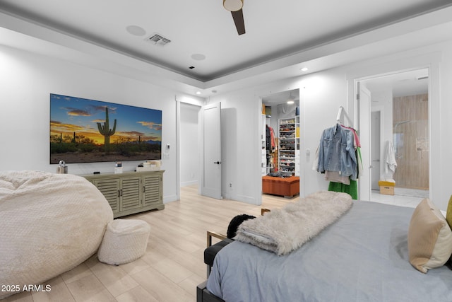 1807 E Campbell Ave, Phoenix, AZ 85016 - bedroom with light wood-style flooring, a walk in closet, ensuite bath, recessed lighting, and a closet