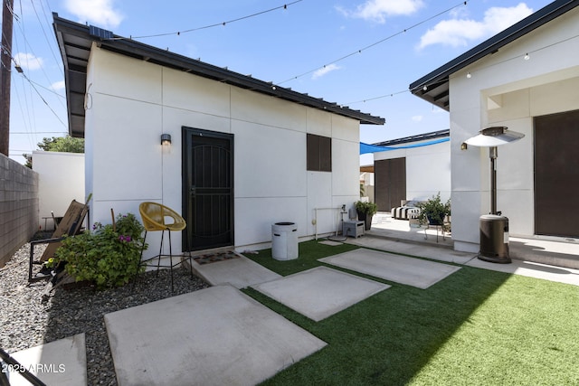 1807 E Campbell Ave, Phoenix, AZ 85016 - rear view of property with a patio area and stucco siding