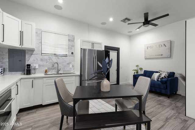 1807 E Campbell Ave, Phoenix, AZ 85016 - dining space featuring a ceiling fan, recessed lighting, and light wood-type flooring