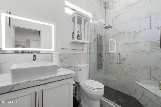 1807 E Campbell Ave, Phoenix, AZ 85016 - full bathroom with tile walls, a shower stall, and vanity