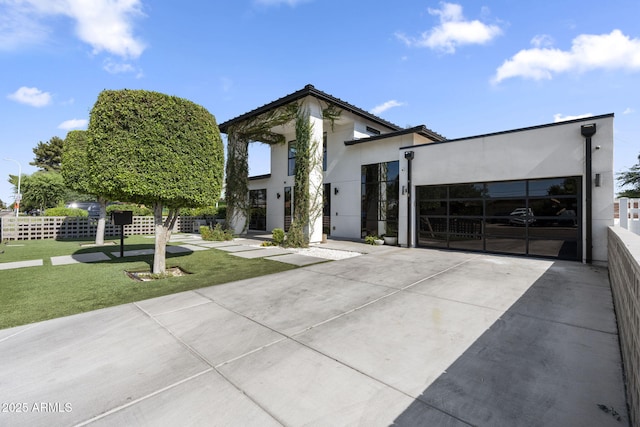 1807 E Campbell Ave, Phoenix, AZ 85016 - contemporary home featuring concrete driveway and stucco siding