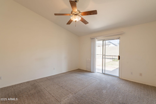 empty room with baseboards, carpet flooring, ceiling fan, and lofted ceiling