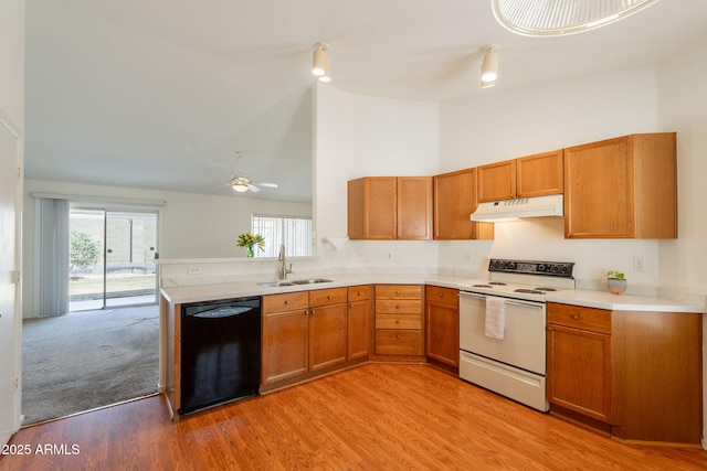 kitchen featuring high vaulted ceiling, under cabinet range hood, a sink, white electric stove, and dishwasher