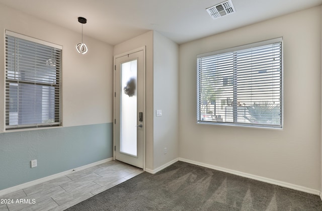 view of carpeted entryway