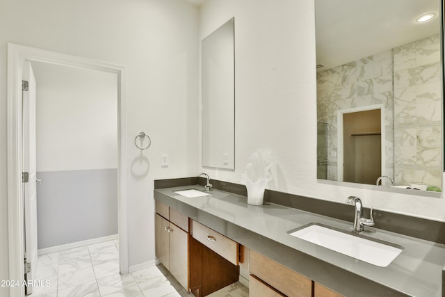 bathroom featuring vanity and tile walls