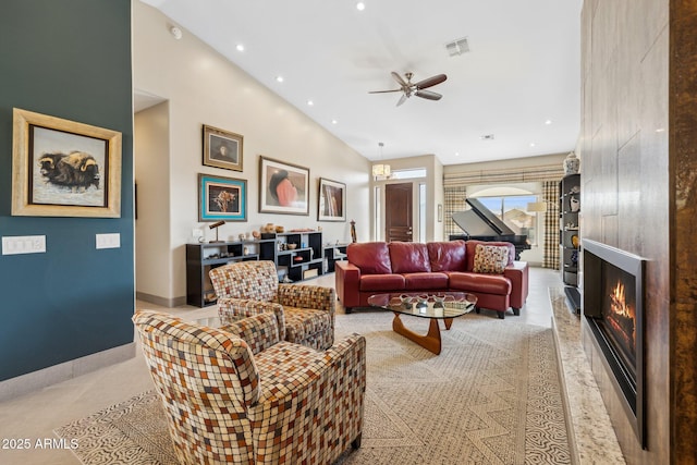 living room featuring a fireplace, recessed lighting, visible vents, ceiling fan, and baseboards