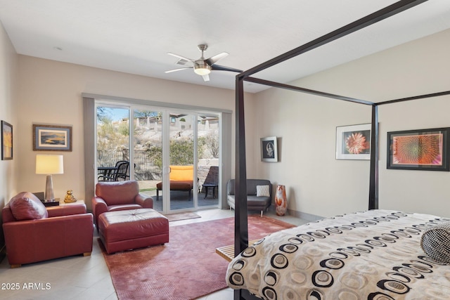 bedroom featuring access to exterior and light tile patterned floors