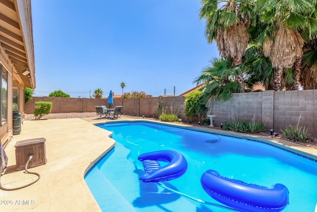 2031 W Gila Ln, Chandler, AZ 85224 - view of swimming pool with a patio area, a fenced backyard, and outdoor dining area