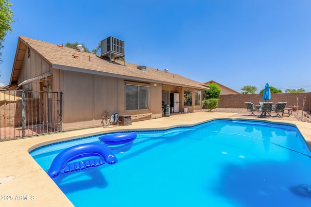 2031 W Gila Ln, Chandler, AZ 85224 - view of pool with cooling unit, a fenced backyard, a patio, and outdoor dining area