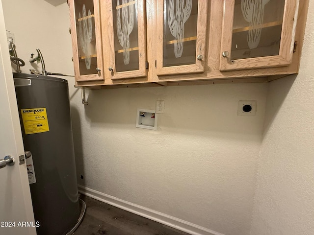 utility room featuring water heater