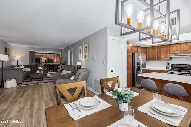 dining area featuring light hardwood / wood-style floors