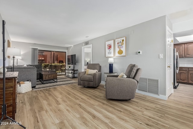 living room featuring light wood-type flooring