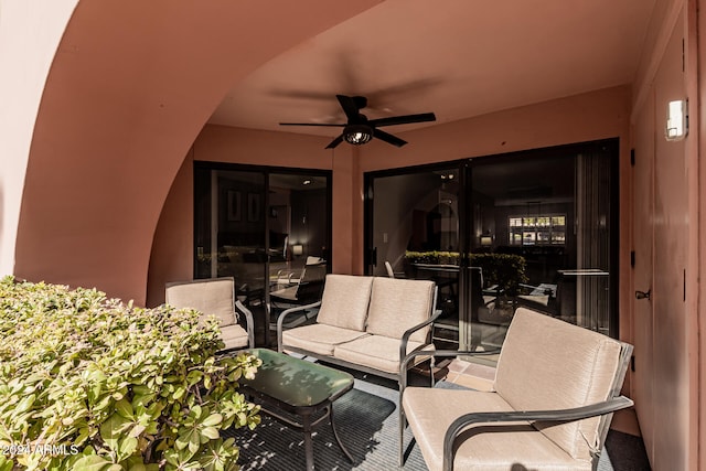 view of patio featuring ceiling fan