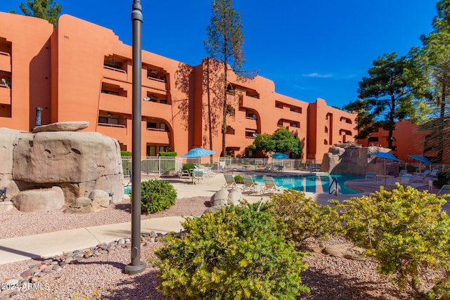 view of swimming pool featuring a patio area