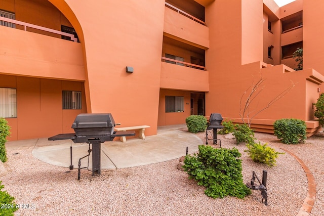 surrounding community with a patio area