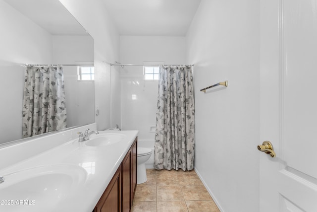 full bathroom featuring tile patterned floors, toilet, vanity, and shower / tub combo with curtain