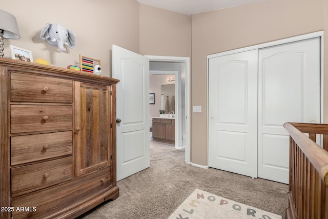 carpeted bedroom featuring a closet