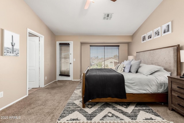 bedroom featuring ceiling fan, vaulted ceiling, and carpet