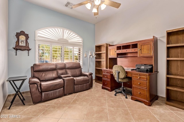 office space with a ceiling fan, light tile patterned floors, and visible vents