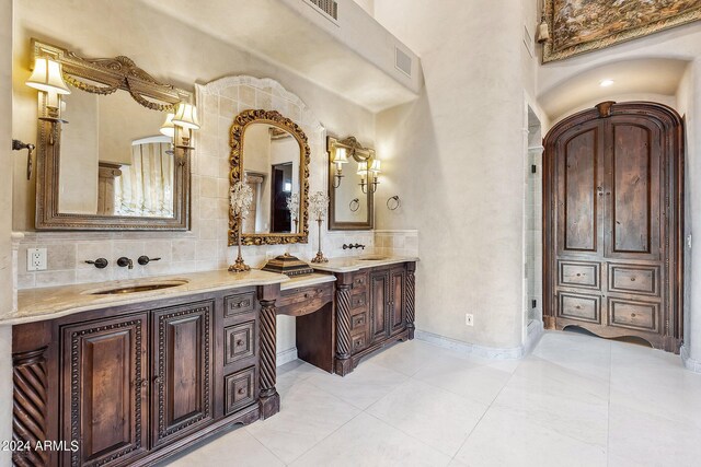 bathroom featuring coffered ceiling, tasteful backsplash, tile patterned floors, and vanity