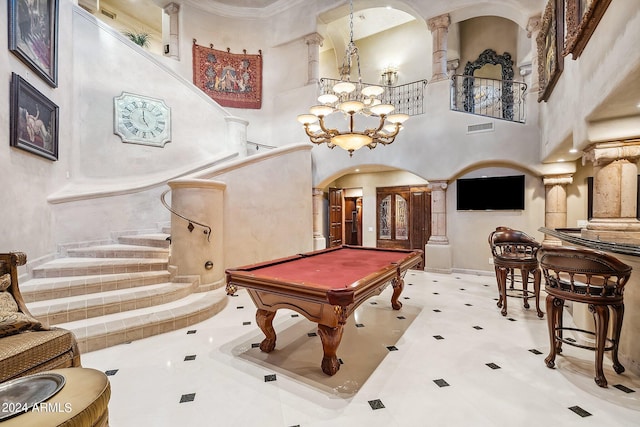 rec room featuring crown molding, pool table, a towering ceiling, and tile patterned floors