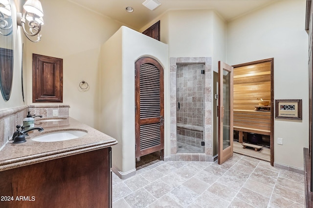 bathroom with vanity, walk in shower, and tile patterned floors