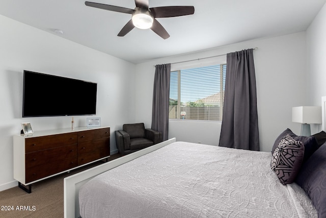 bedroom featuring ceiling fan and carpet floors