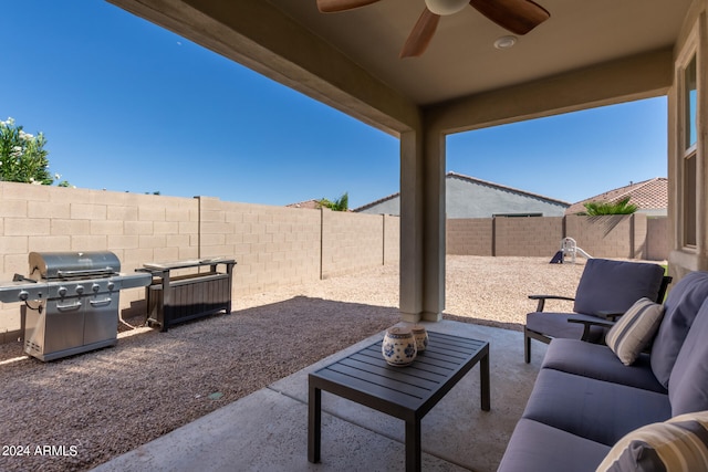 view of patio / terrace featuring ceiling fan and grilling area