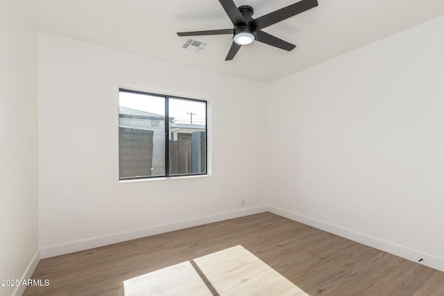 1338 E Granada Rd, Phoenix, AZ 85006 - empty room featuring a ceiling fan and wood finished floors