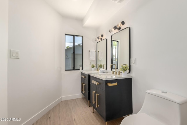 1338 E Granada Rd, Phoenix, AZ 85006 - bathroom featuring vanity and wood finished floors