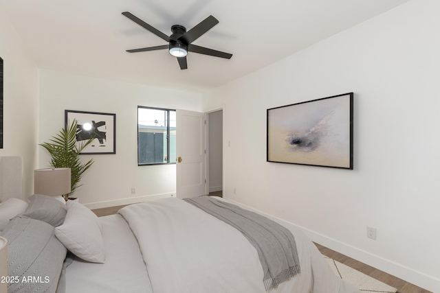 1338 E Granada Rd, Phoenix, AZ 85006 - bedroom featuring wood finished floors and ceiling fan