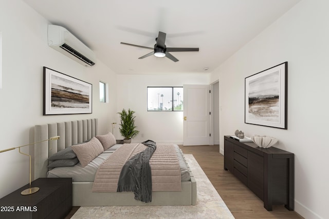 1338 E Granada Rd, Phoenix, AZ 85006 - bedroom with an AC wall unit, light wood finished floors, and ceiling fan