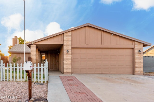 view of front of property with a garage