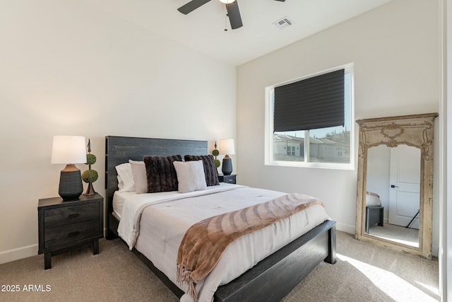 bedroom featuring ceiling fan and light colored carpet