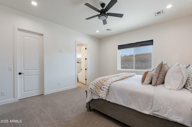 carpeted bedroom featuring connected bathroom and ceiling fan